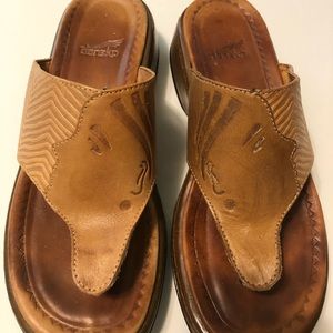 Dansko women’s silhouette carved in leather